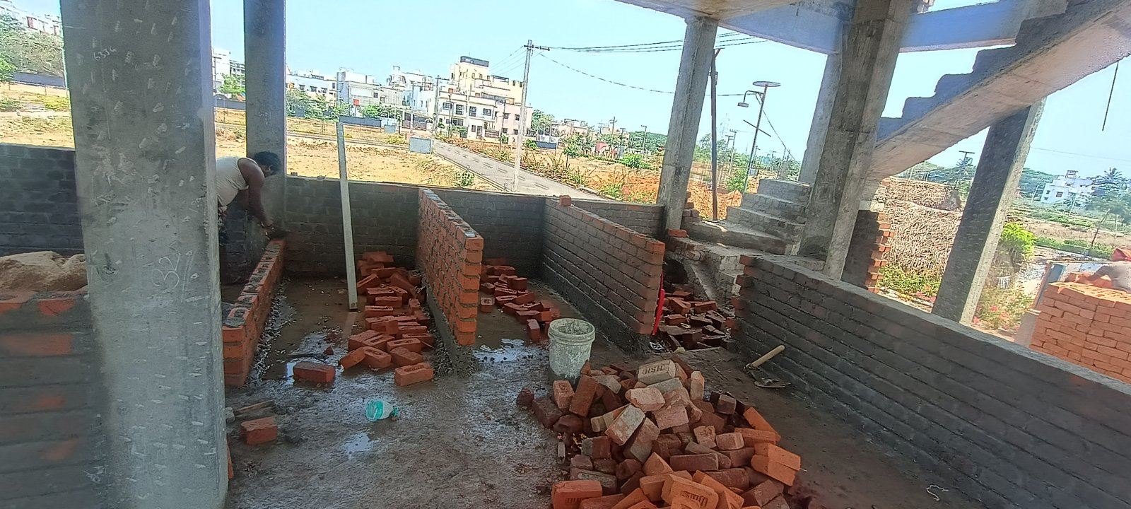 Brick wall construction work inside commercial building structure